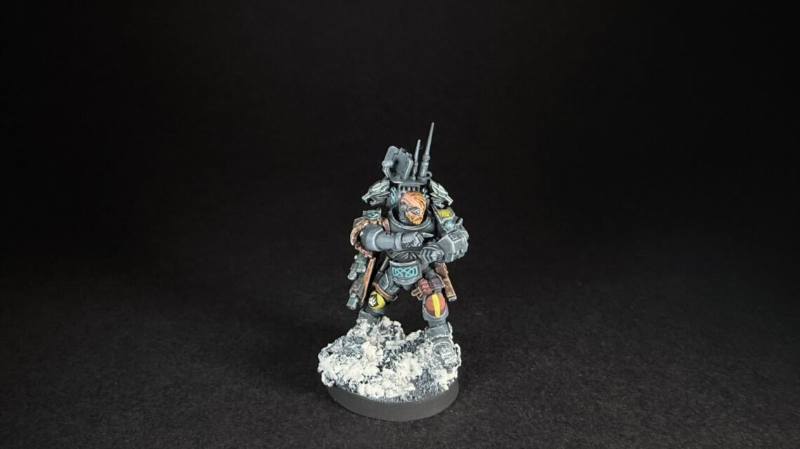 Painted Wolf Scout Frosteye with Instigator Bolt Carbine on a snowy base.
